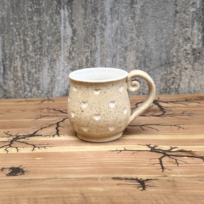 Heart-decorated handmade mug
